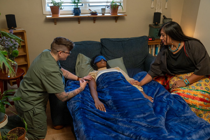 about the clinic two practitioners with a client for a ketamine session